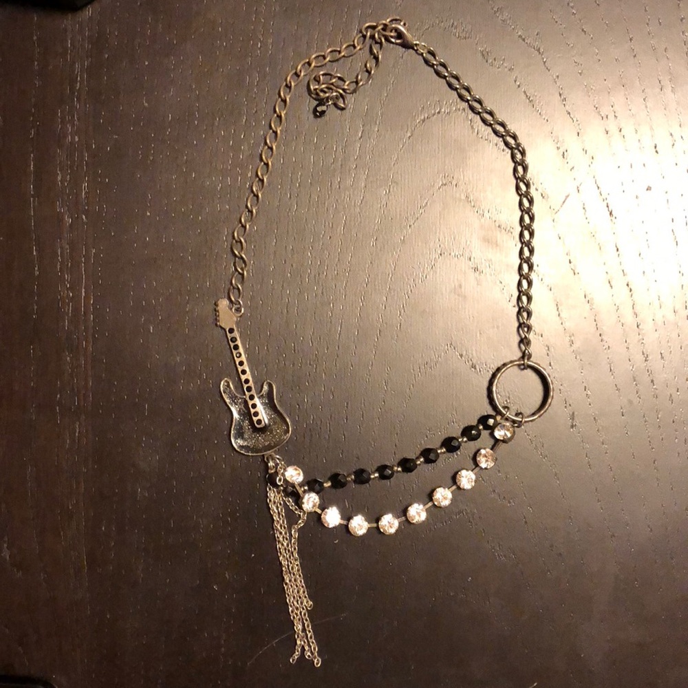 Guitar rocker necklace from lollipops paris France